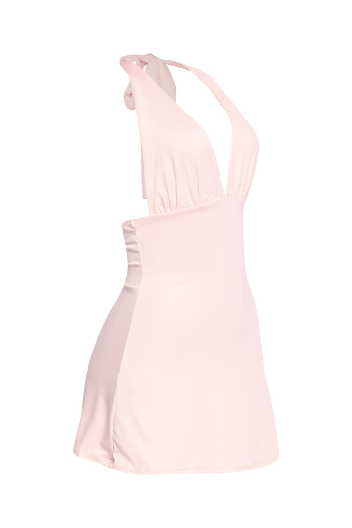 Baby pink backless mini dress for warm weather styling and vacays

