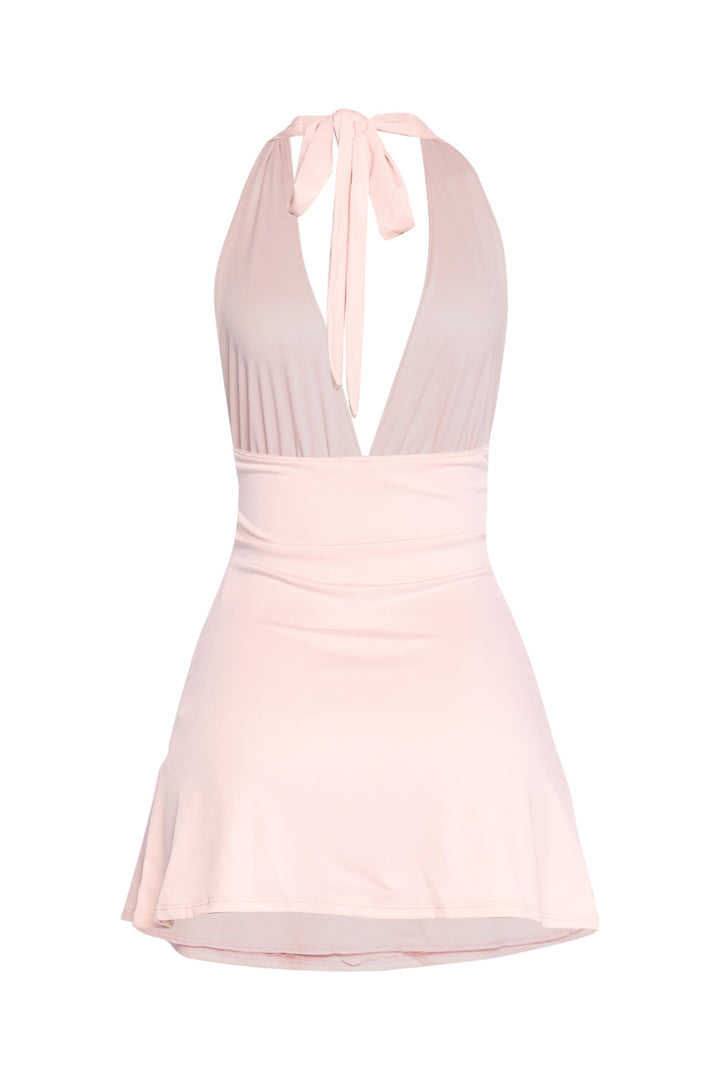 Light pink halter mini with sexy front plunge and soft girly energy

