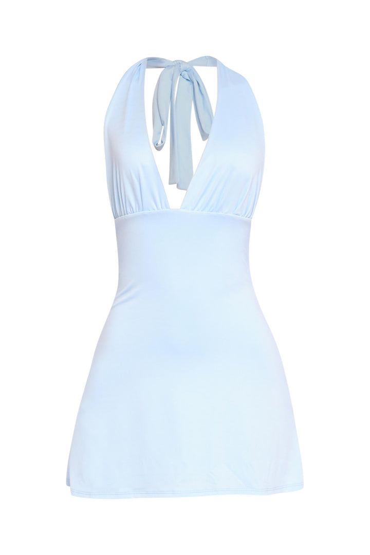 Soft pastel halter dress with gathered bust and low open back

