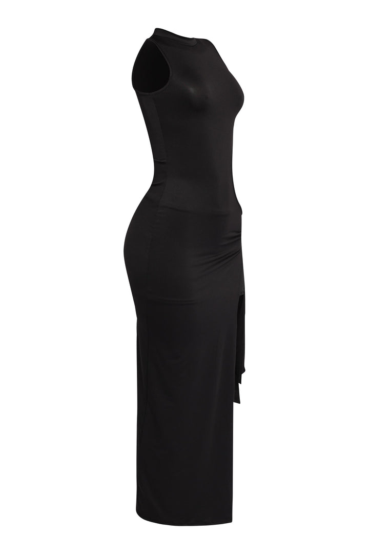 Elegant yet edgy black cutout dress with curve-hugging shape

