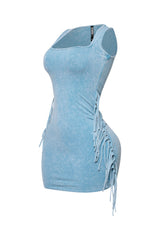 Sleeveless stretch blue mini with edgy fringe down hips

