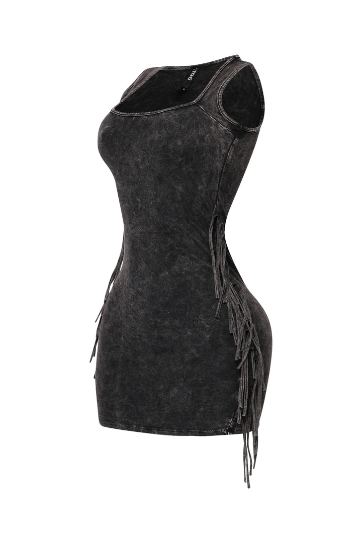 Edgy black fringe dress with raw wash finish and bold style

