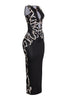 Fitted black maxi dress with tan print accents and bold trim details
