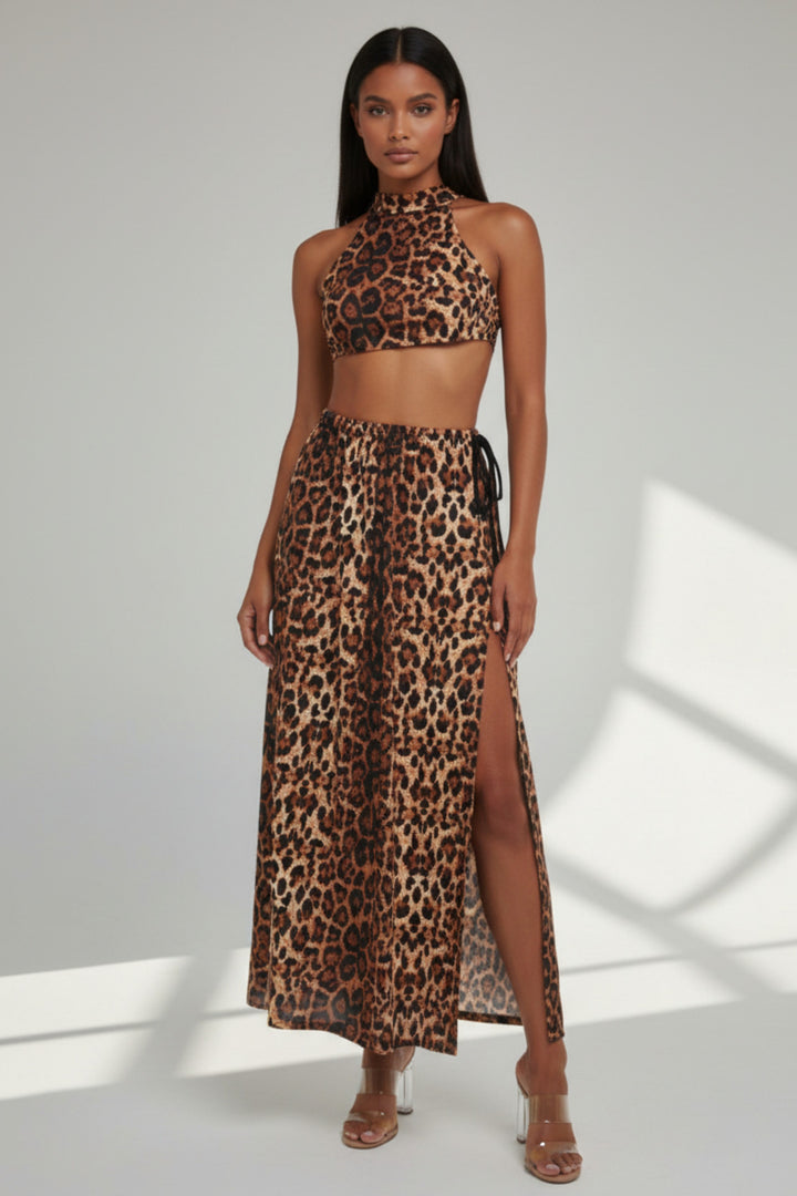 Woman wearing a leopard print outfit on a white background