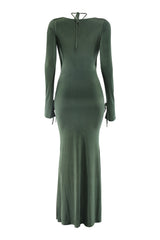 Green dress with long sleeves on a white background