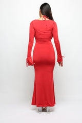 Red dress with long sleeves on a white background