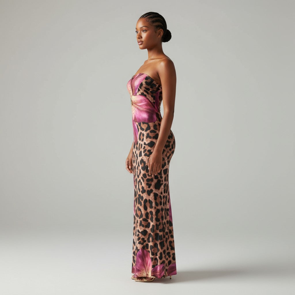 Right angled view of curve-hugging animal print maxi dress with vibrant floral details and flared finish