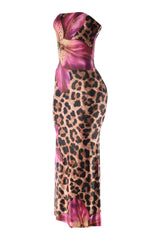 Left angled view of strapless leopard print maxi dress with bold pink floral accents and flared hem