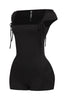 Rear view of black cap sleeve romper with short inseam and snug stretchy fit

