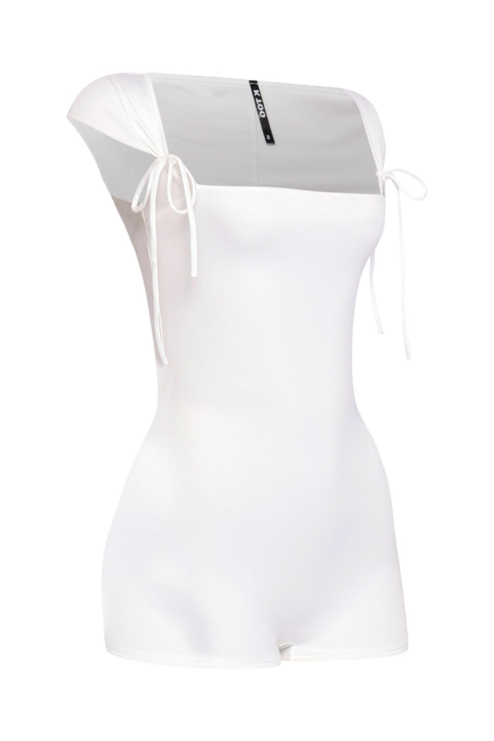 Chic white romper featuring curve-hugging fit, squared neckline, and soft cap sleeves



