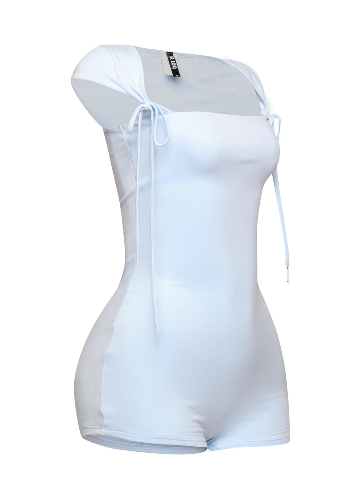 Light blue one-piece with curved fit and shoulder bow ties styled in dreamy palette

