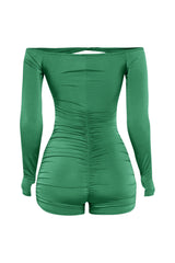 Vibrant green bodycon one-piece with starfish hardware

