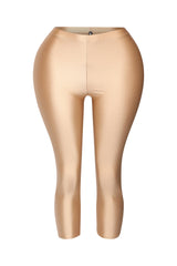 Metallic gold leggings with high-shine finish and capri cut

