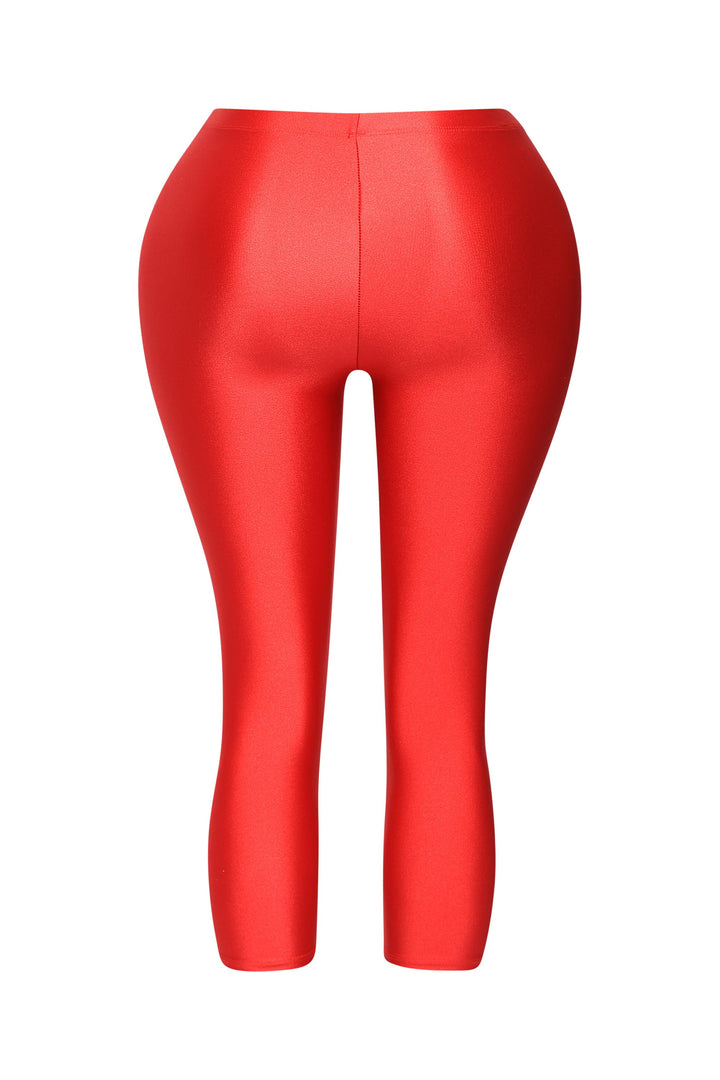 Red bodycon leggings with high shine texture and pull-on waistband

