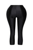Sleek black capri leggings with glossy sheen and tight stretch silhouette

