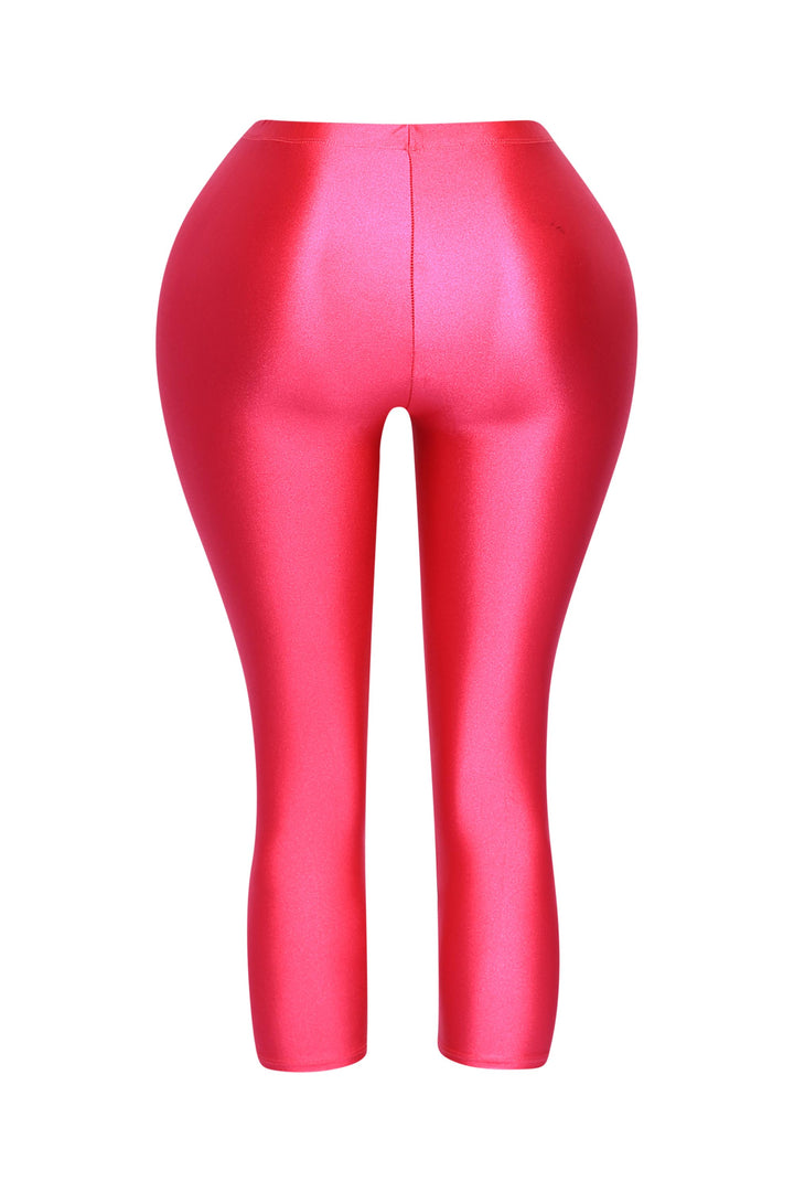 Neon pink leggings with high waist and ultra-gloss fabric finish

