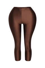 Chocolate brown capri leggings with glossy finish and body-hugging stretch

