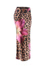 Right angled view of bold print flared maxi skirt featuring tropical pink flower and animal print