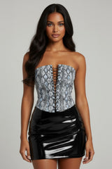 Front view of light snake print tube top with lace-up corset-style detailing