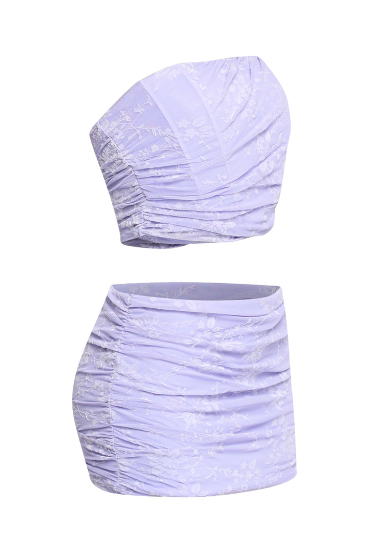 Side view of lavender two piece outfit with shirred detailing

