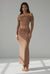 Brown two-piece set with mock neck crop top and flared maxi skirt front view