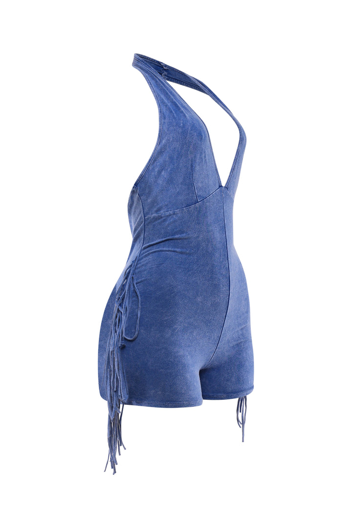 Blue halter romper featuring open back and fringe detail