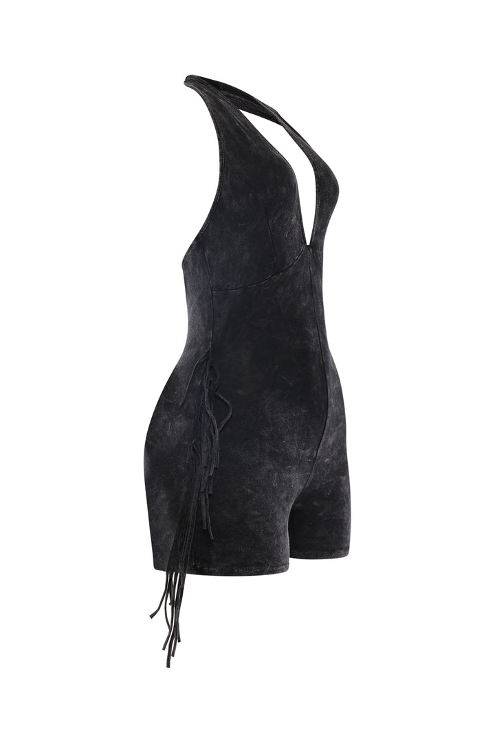Black halter romper featuring open back and fringe detail