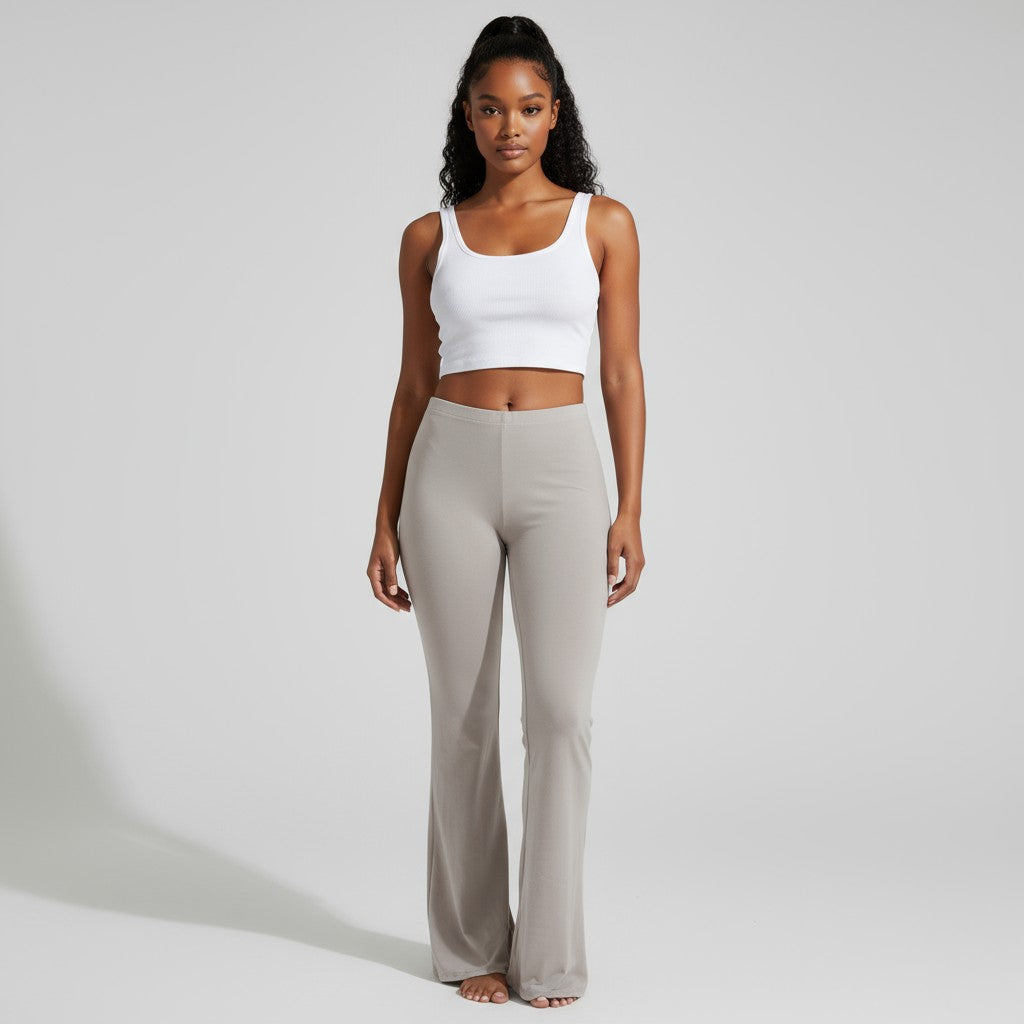 Front view of beige high waisted flare pants with soft drape and wide hem