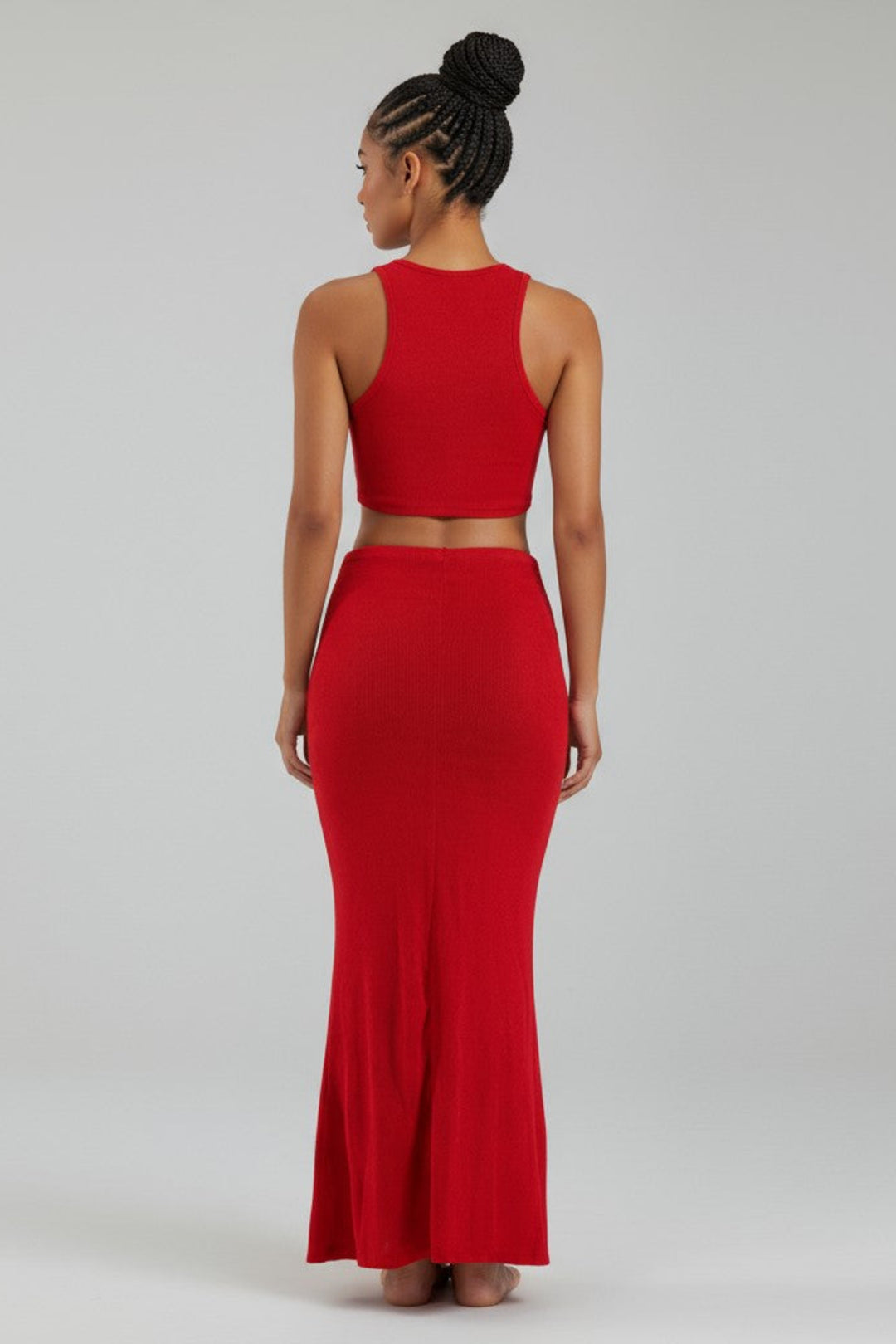 Back view of red maxi two-piece outfit with slim fit and body-hugging stretch