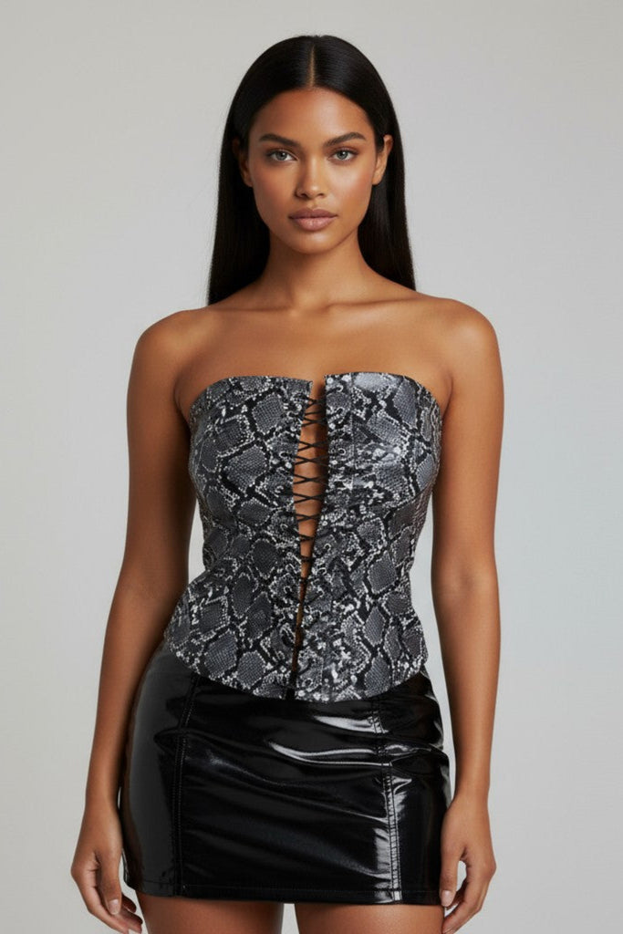 Front view of black and grey snake print tube top with lace-up detailing